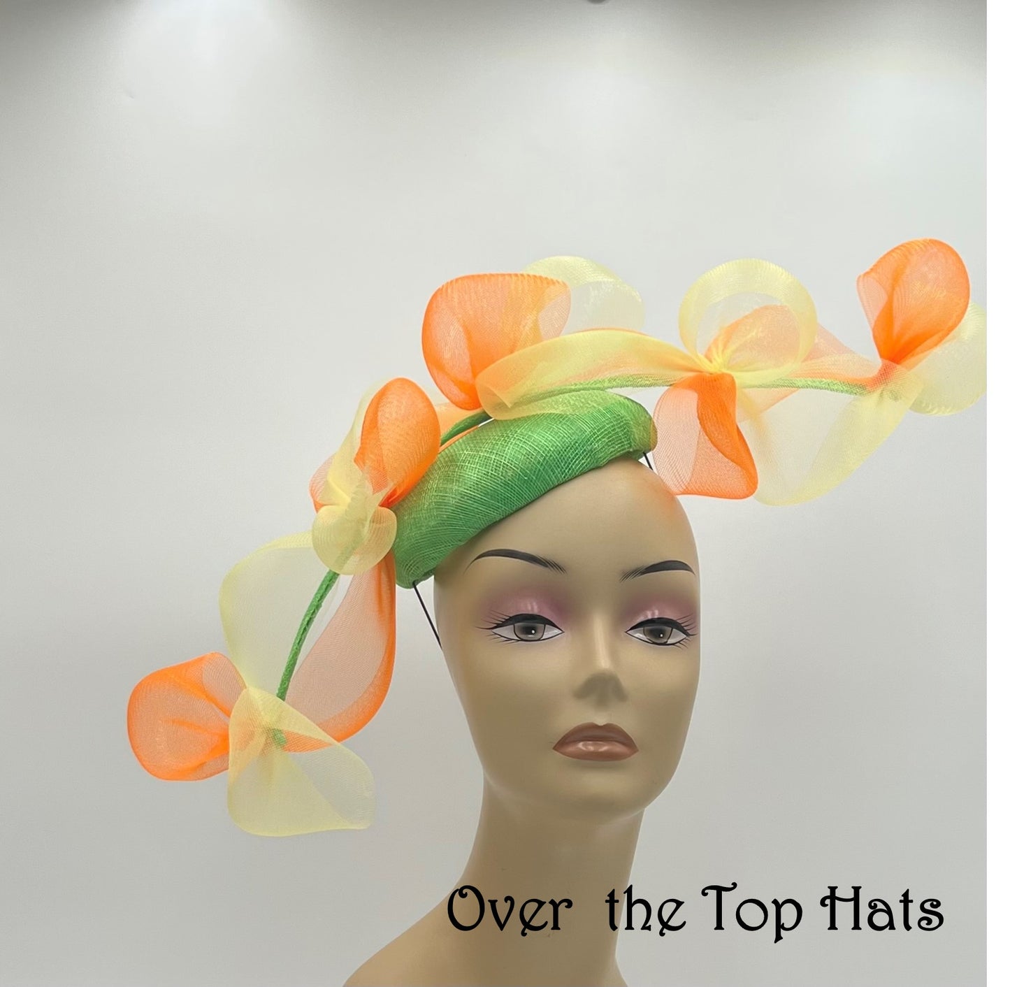 Lime Fascinator with Yellow and Orange Trim
