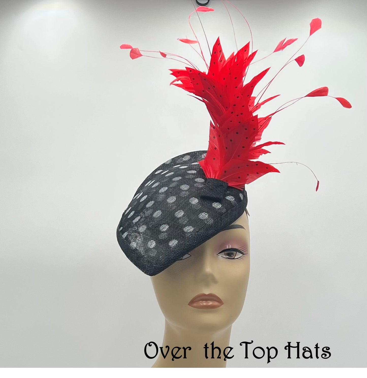 Black and white Percher Fascinator with Red and Black Feathers for Special Occasion
